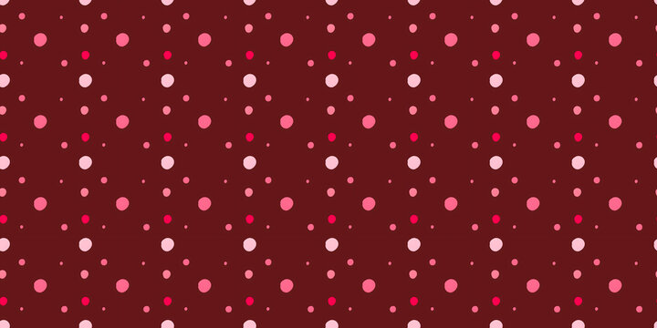 Seamless polka dot pattern with hand-drawn pink and red circles on a dark maroon background