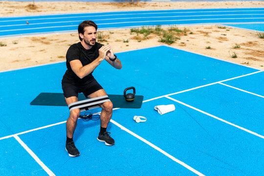 Wide View Band Squat