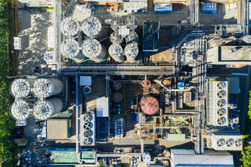 Aerial Industrial Facility Storage Tanks and Machinery Overview