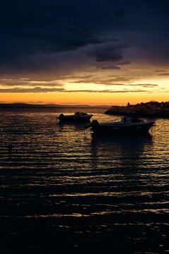 Film photo of boats at sunset in Croatia
