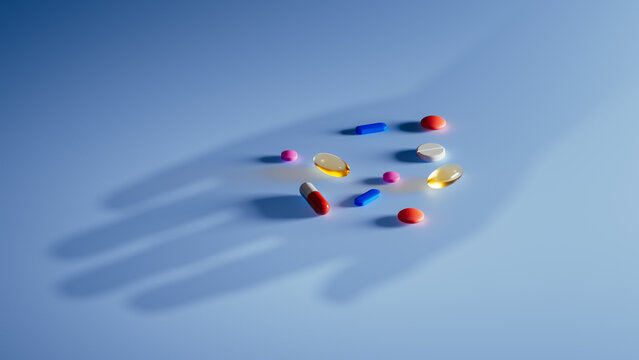 Silhouette of head with creatively arranged pills and supplements