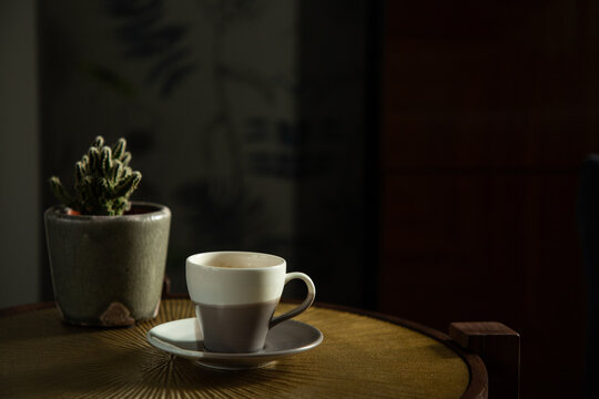 Low light coffee and cactus