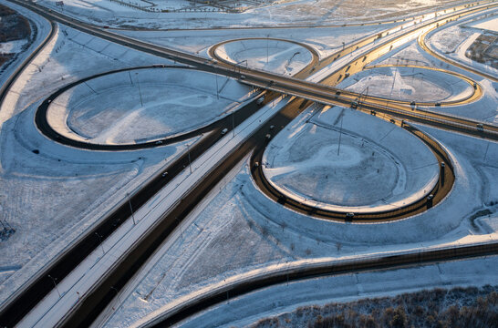Snow-covered Highway Interchange in Winter Light
