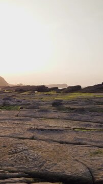 Sunset over Seal Rock and Tofu Rock Formations in Badouzi, Keelung (Vertical Video)
