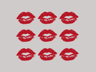 Fototapeta premium Collection of red lipstick kiss marks on lips gray background