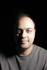 Obraz premium Portrait of a middle-aged Iranian man with studio lighting