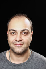 Obraz premium Portrait of a middle-aged Iranian man with studio lighting