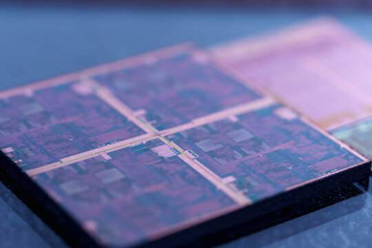 Close-up View of a Microchip on a Reflective Surface