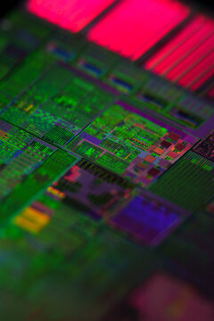 Intricate Details of a Colorful Microchip Under Bright Light