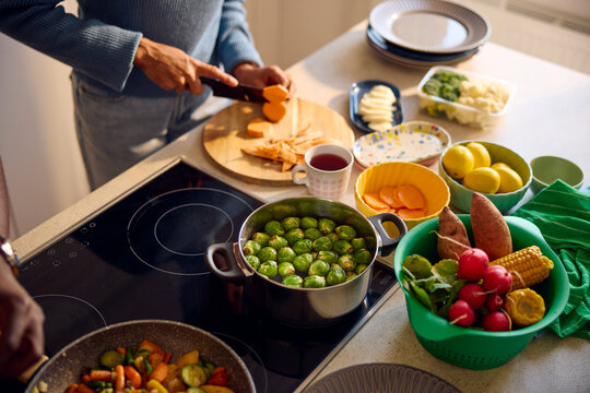 People preparing food at home