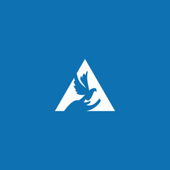 Fototapeta premium logo of a hand holding a bird inside a triangle