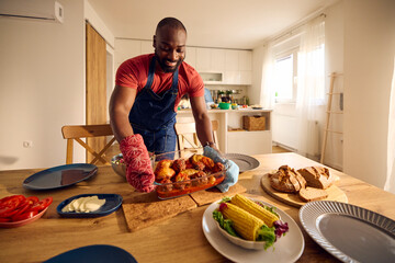 Man serves food on the table