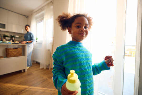 Little girl rummages in the house