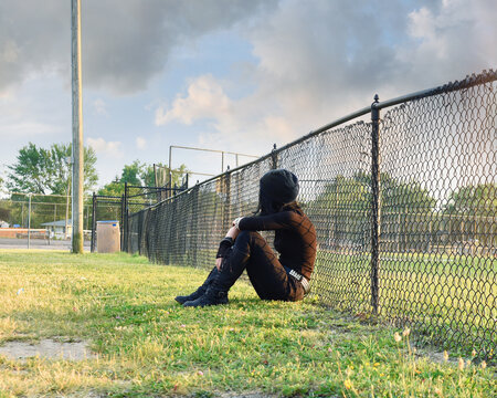 Sad Fashion Emo Punk Girl Alone at Fence
