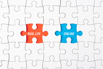 White jigsaw puzzle with missing pieces revealing REAL LIFE and ONLINE text, representing the digital detox concept, internet usage balance, mental wellbeing, and screen time management.
