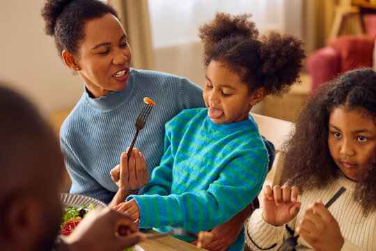 Woman argues with her daughter over food