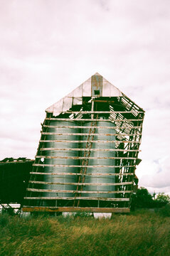Old Grain Silos in an Abandoned Rural Area