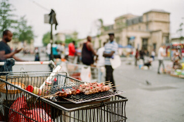 Street Vendors Grilling Skewers