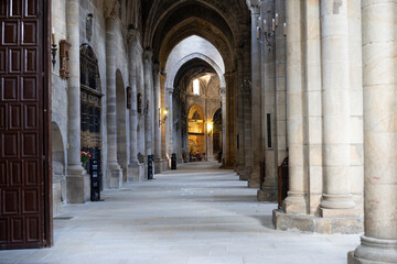 Fototapeta premium Interior view of a stone cathedral corridor.. Orense Cathedral, Spain