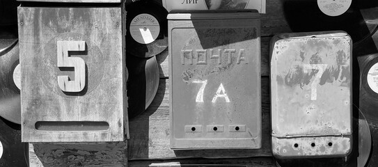 Vintage Mailboxes Wall Closeup Monochrome. Urban Texture Industrial Blackwhite