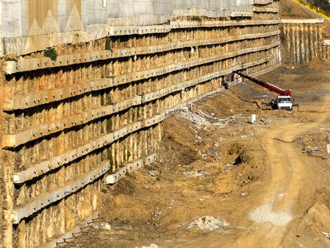 Retaining Wall and Crane in Deep Excavation Area