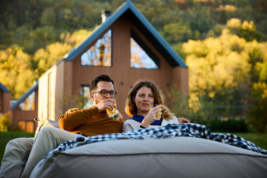 Man and woman taking a break outside
