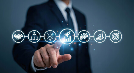 Businessman touching glowing startup rocket icon in conceptual business strategy interface