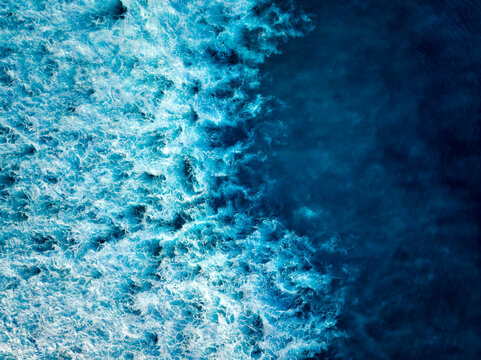 Top down aerial view of tropical blue ocean wave