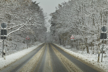 Wintery street with snow and slush
  - atmospheric winter landscape


