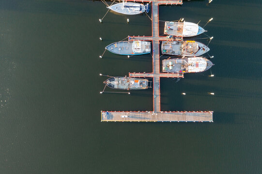 Fishing boats docked at a jetty
