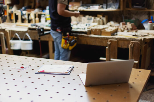 Workspace in a woodworking shop during a busy day of crafting