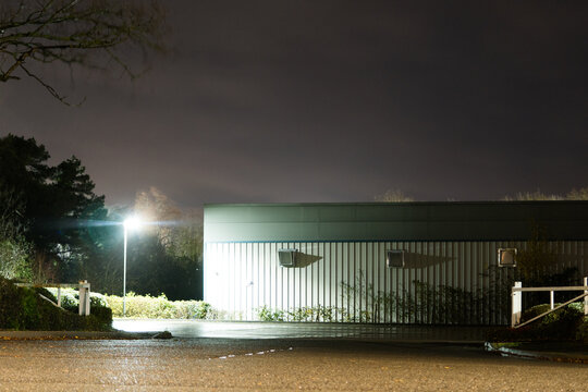 Modern warehouse on a wet rainy night