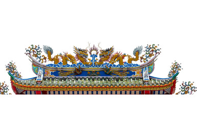 A traditional Chinese dragon sculpture decorates the colorful roof of an ancient oriental temple building under a clear blue sky, showcasing intricate Buddhist architecture and Asian culture