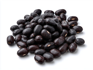 Fototapeta premium A close-up, high-angle view of a pile of raw, dried black beans, which appear to be black turtle beans (Phaseolus vulgaris), scattered on a plain white background. 