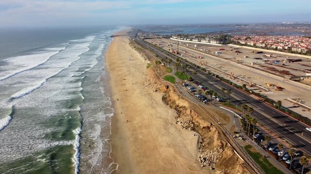 Coastal sunset view of Huntington Beach, Orange County, California - Pacific West Coast. Aerial Landscape Looking from Dog Beach toward Bolsa Chica along PCH Highway 1