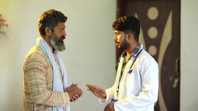 indian farmer discussing with doctor 