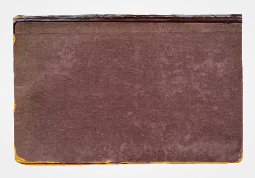 Old brown cover book with vintage green isolated on white, top view. Worn book cover, vintage paper texture, visible scratches. Aged knowledge, retro style, academic nostalgia background, copy space