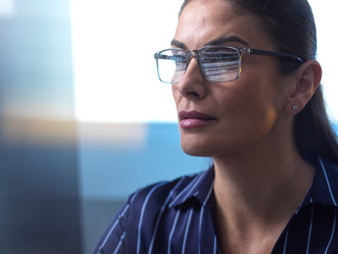 Software engineer coding with artificial intelligence at office