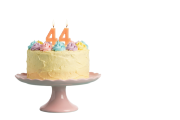 Yellow Birthday Cake with Number 44 Candles on Pink Stand