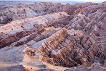 Bizarre rock formations in Moon Valley near San Pedro de Atacama at sundown