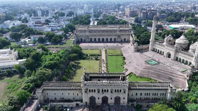 Drone shot of Bara Imambara and Rumi Gate in Lucknow with Gomti River and city skyline