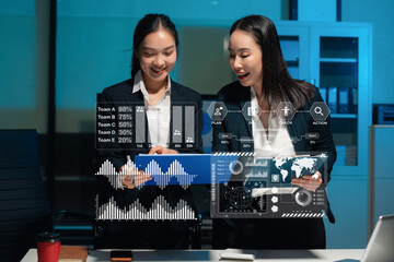 Business team hand Project manager working and update tasks and Gantt chart scheduling virtual diagram with tablet and laptop in office.