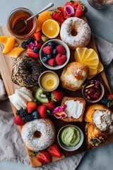 Fresh pastries and fruits arranged on a wooden board at breakfast time
