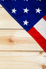 Overhead view of usa flag with stars and stripes on wooden table