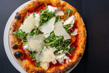 Artisan pizza cooked in oven with bubbling cheese and authentic Italian style