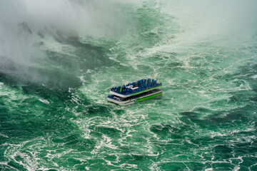 Obraz premium Boat cruise under Niagara Falls, aerial view