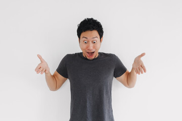 Thai man shrugging shoulders with confused expression