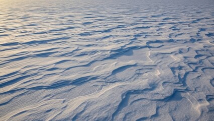 Ripples on calm water surface at sunrise.