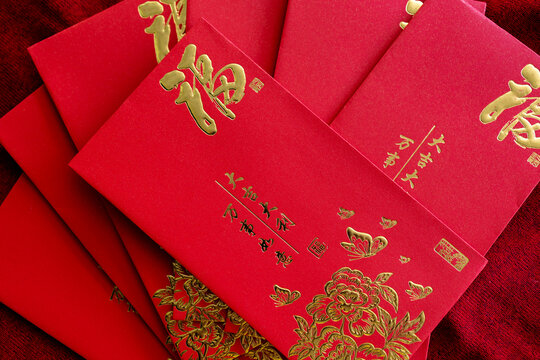 Red envelope, Red packet, Hong Bao hongbao for Giving, Angpao with gold Fu symbol, Symbolizing blessings, Luck, Prosperity, and Giving during Lunar New Year Celebration