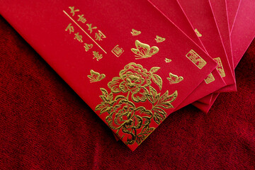 Red envelope, Red packet, Hong Bao hongbao for Giving, Angpao with gold Fu symbol, Symbolizing blessings, Luck, Prosperity, and Giving during Lunar New Year Celebration